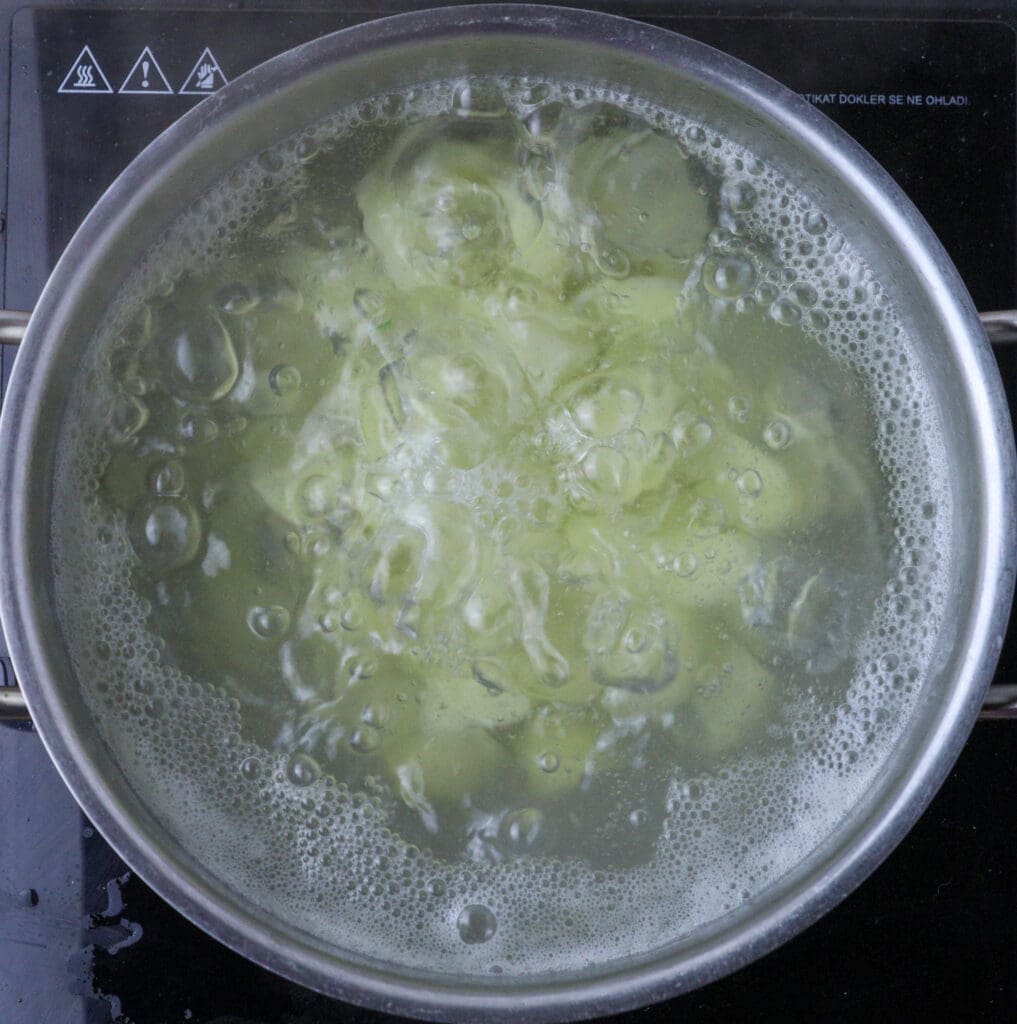 image of boiling the potatoes
